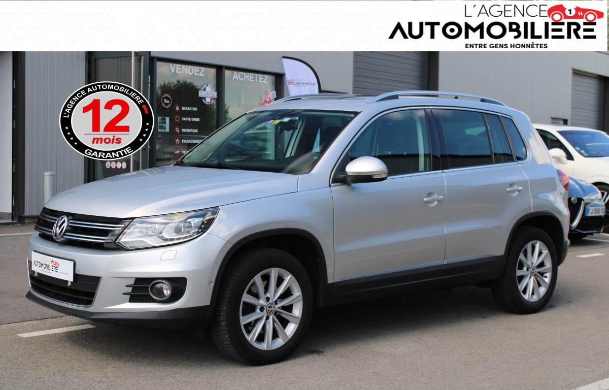 Volkswagen Tiguan 2.0 TDI 140 CARAT 4MOTION DSG BVA — 1