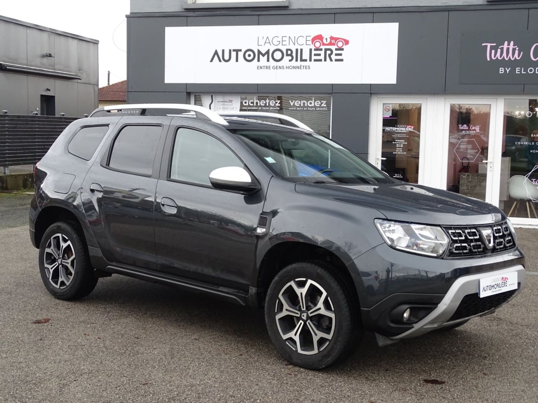 Dacia Duster 1.5 DCI 115 4X2 PRESTIGE - CAMERA - ATTELAGE — 1