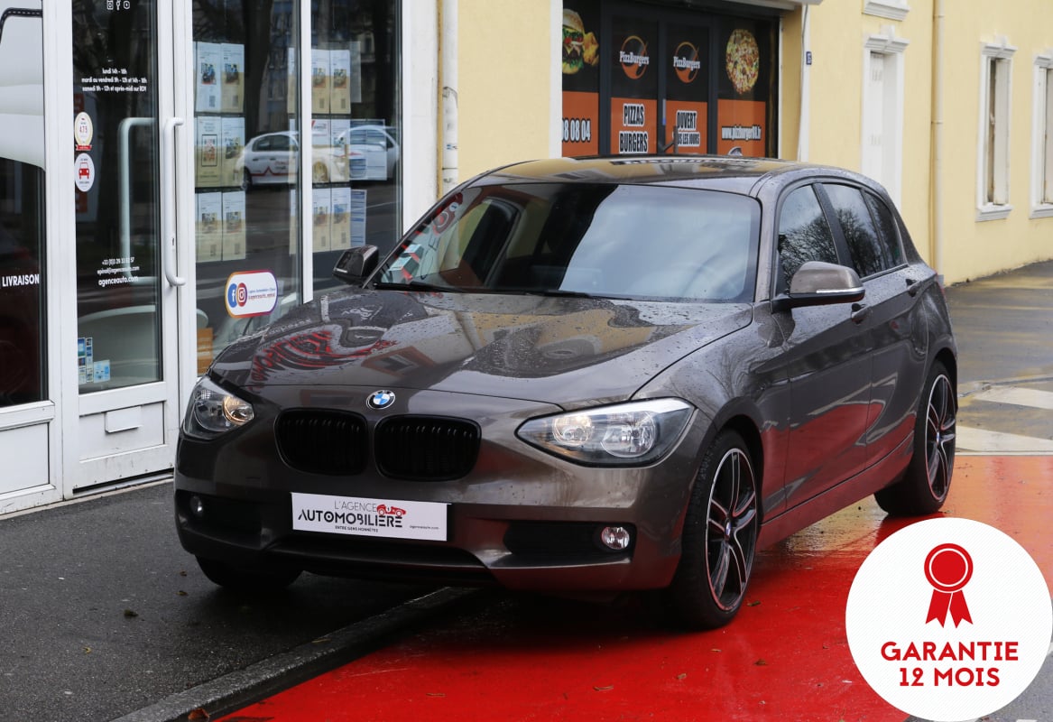 BMW Série 1 F20 116d Lounge BVM6 (Sièges chauffants, Caméra de recul, Jantes Alu 18",...) — 1