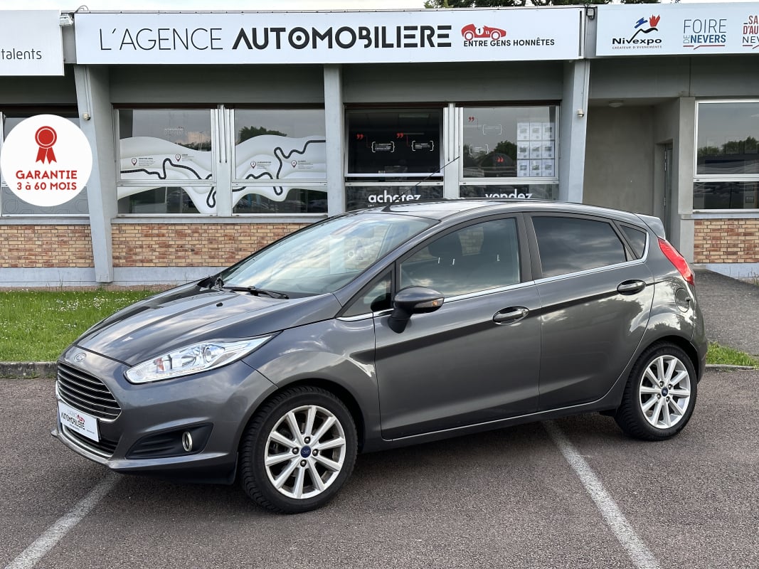 Ford Fiesta ECOBOSST 1.0L 100 ch TITANIUM 5P/radar de recul/BLUETOOTH/ATTELAGE — 1