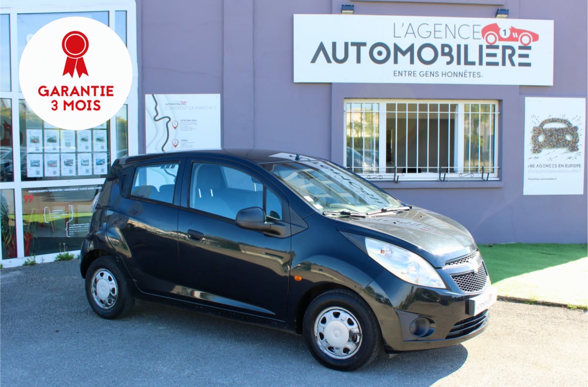 Chevrolet Spark 68cv 1.0 - distribution à CHAINE — 1