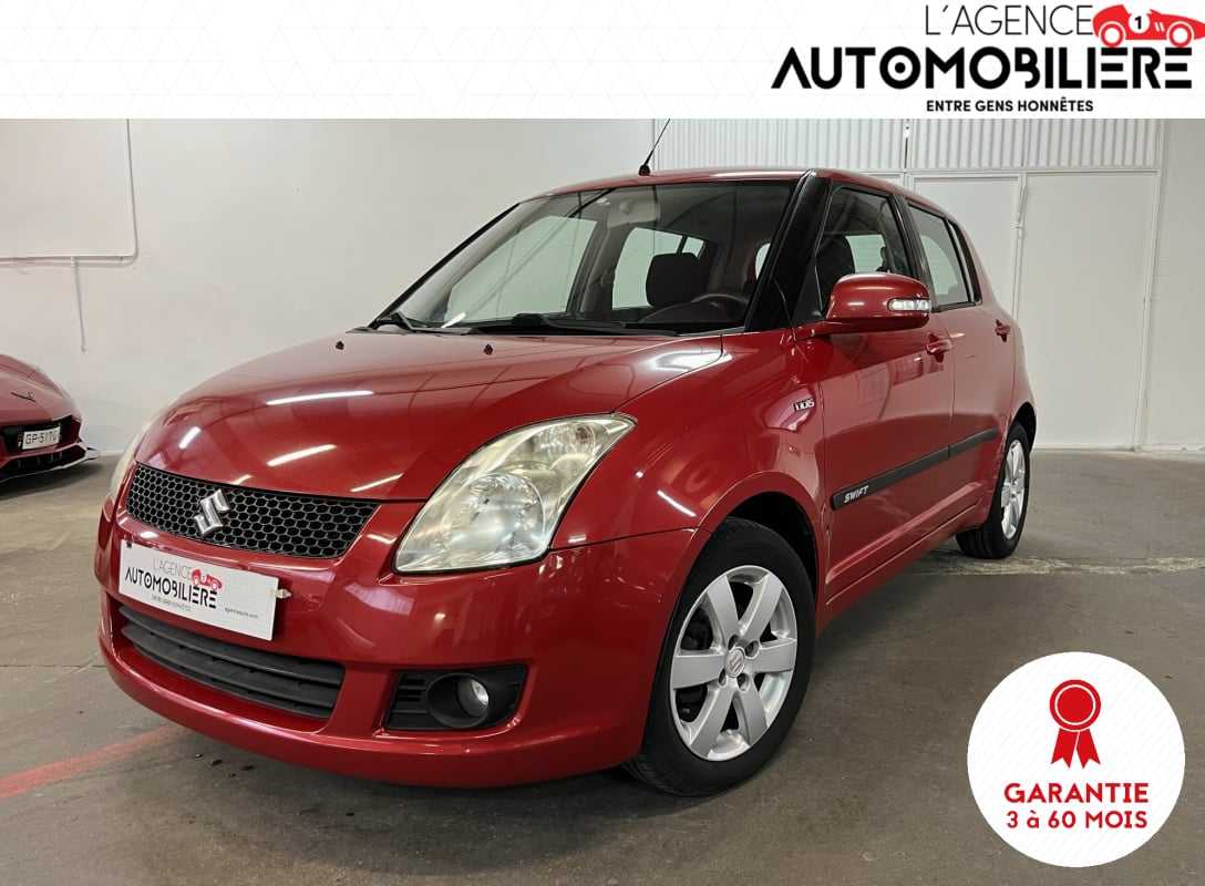 Suzuki Swift 1.3 75 cv — 1