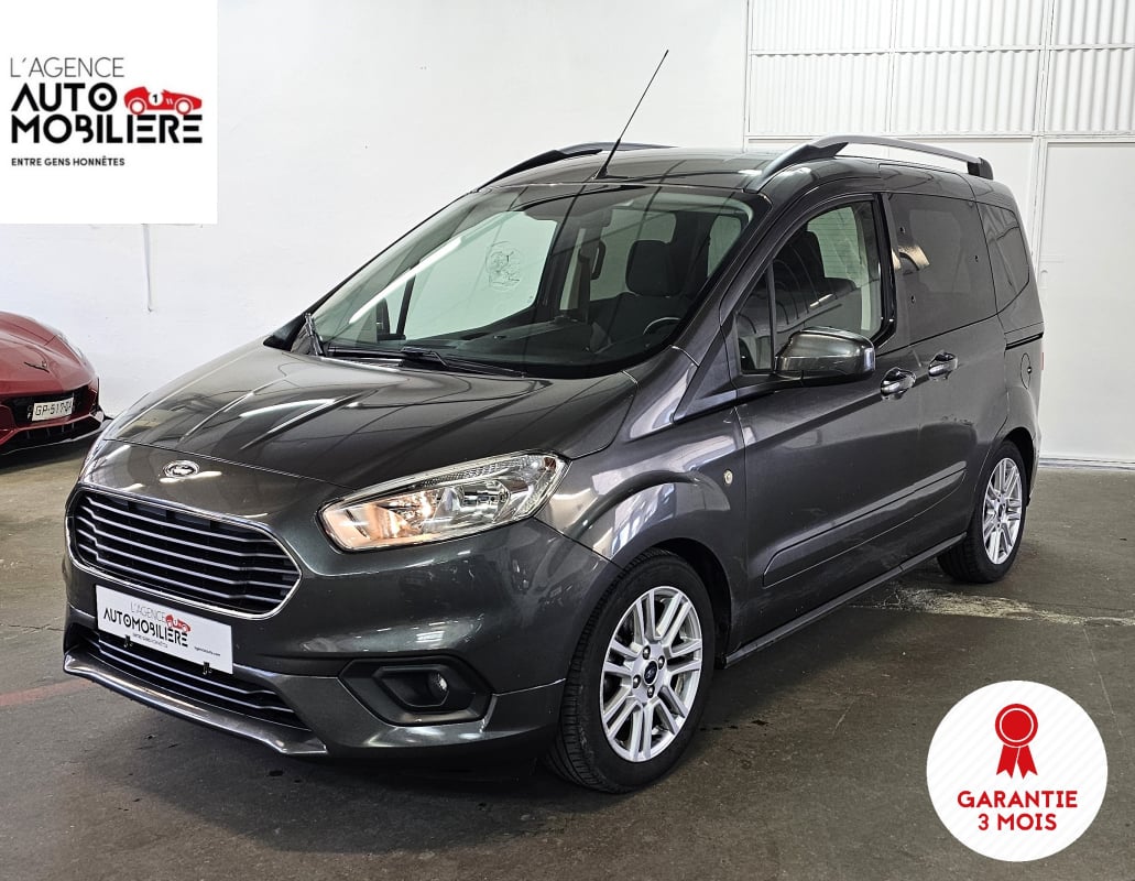 Ford Tourneo Courier 1.5 TDCI 75 TITANIUM — 1