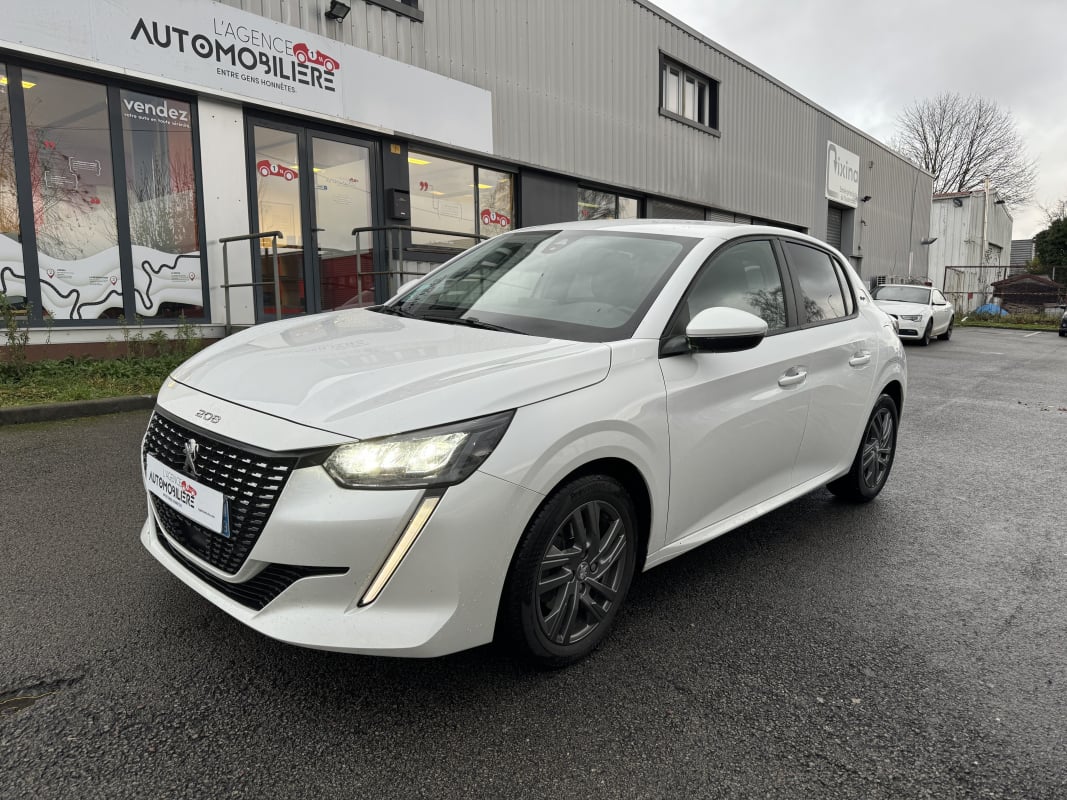 Peugeot 208 100CH STYLE 1ERE MAIN — 1