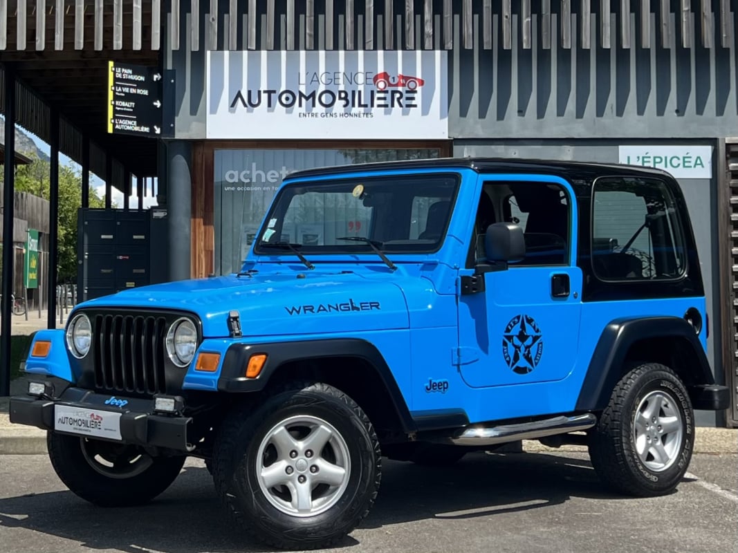 Jeep Wrangler TJ 2.4i 143ch Sport / 2°Main — 1