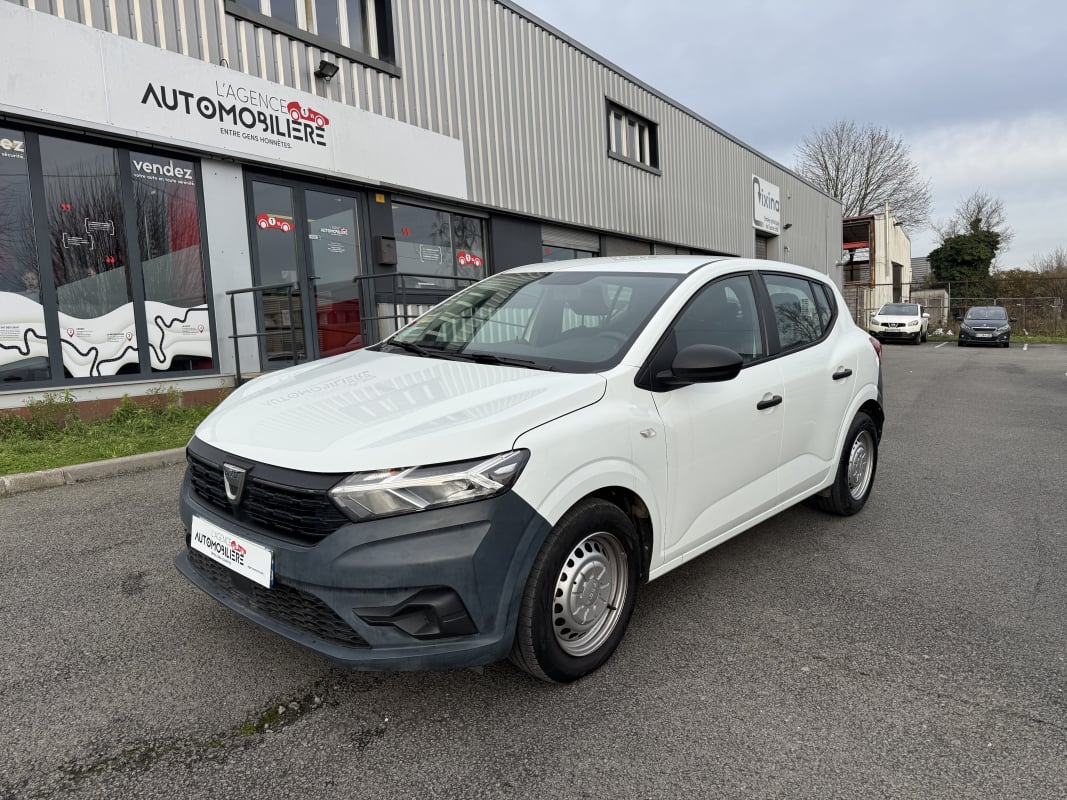 Dacia Sandero 1.0 SCE 65CH ACCESS 1ER MAIN FAIBLE KILOMETRAGE — 1