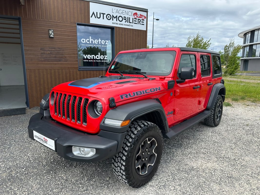 Jeep Wrangler JEEP RUBICON UNLIMITED 4xe 2.0 381 CH 4WD BOÎTE AUTO 1ÈRE MAIN - 8800 KM - TEINTE FIRECRACKER RED - (DOUBLE TOIT HARDTOP INCLUS + CAPOTE EN TOILE) — 2