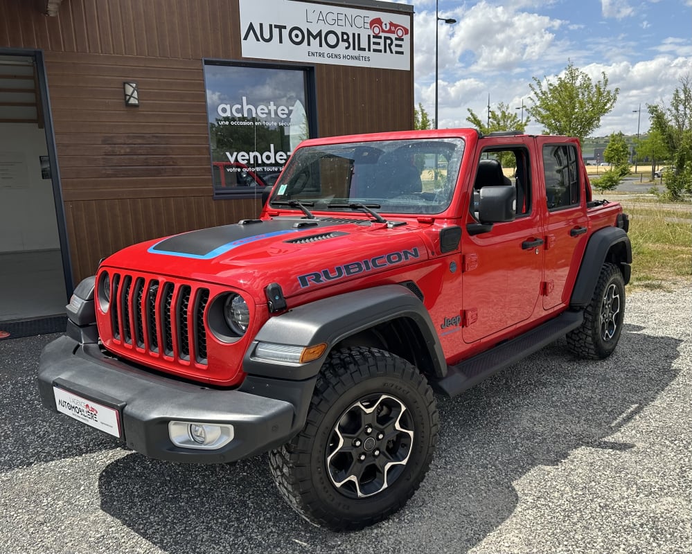 Jeep Wrangler JEEP RUBICON UNLIMITED 4xe 2.0 381 CH 4WD BOÎTE AUTO 1ÈRE MAIN - 8800 KM - TEINTE FIRECRACKER RED - (DOUBLE TOIT HARDTOP INCLUS + CAPOTE EN TOILE)
