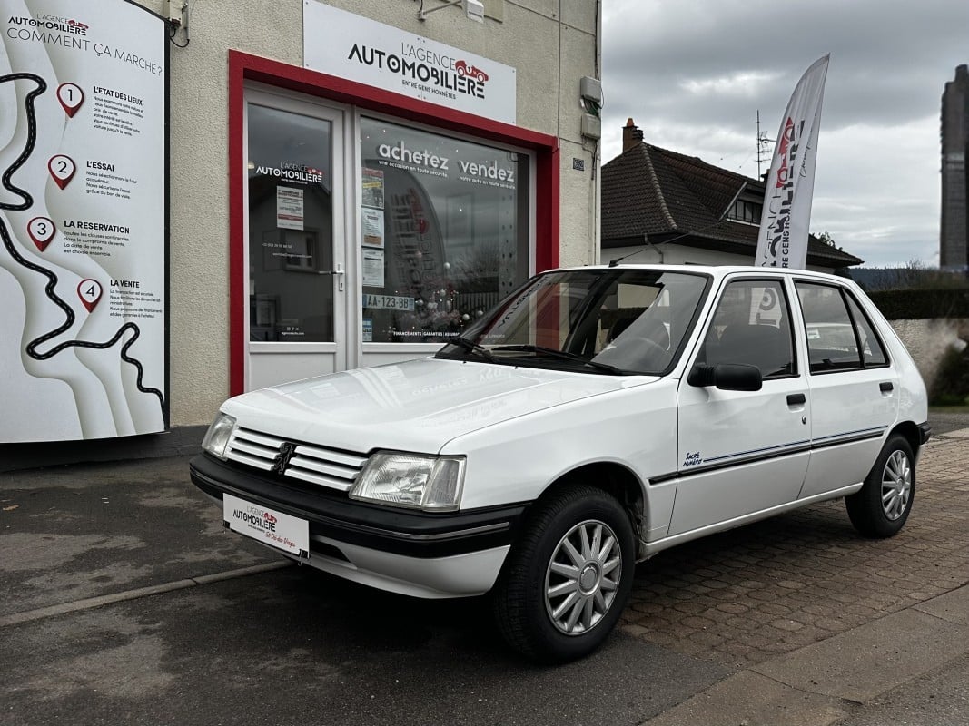 Peugeot 205 Phase 2 1.4 i TU 75ch Sacré Numéro — 1