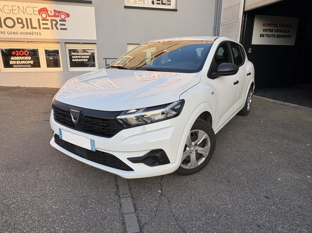 Dacia Sandero 1.0i SCE 65 ESSENTIEL - Climatisation - Vitres électriques - Roue de secours — 1