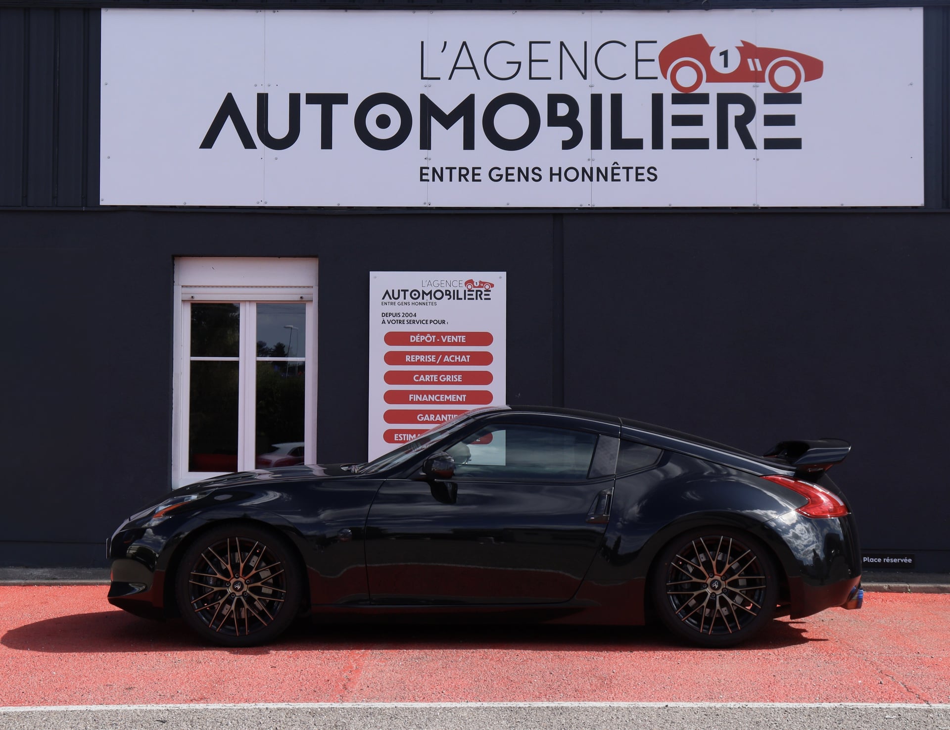 Nissan 370Z (Z34) 3.7 i V6 328 Pack Coupé BVA7 (Volant meplat, Demi ligne, Aileron...) — 2