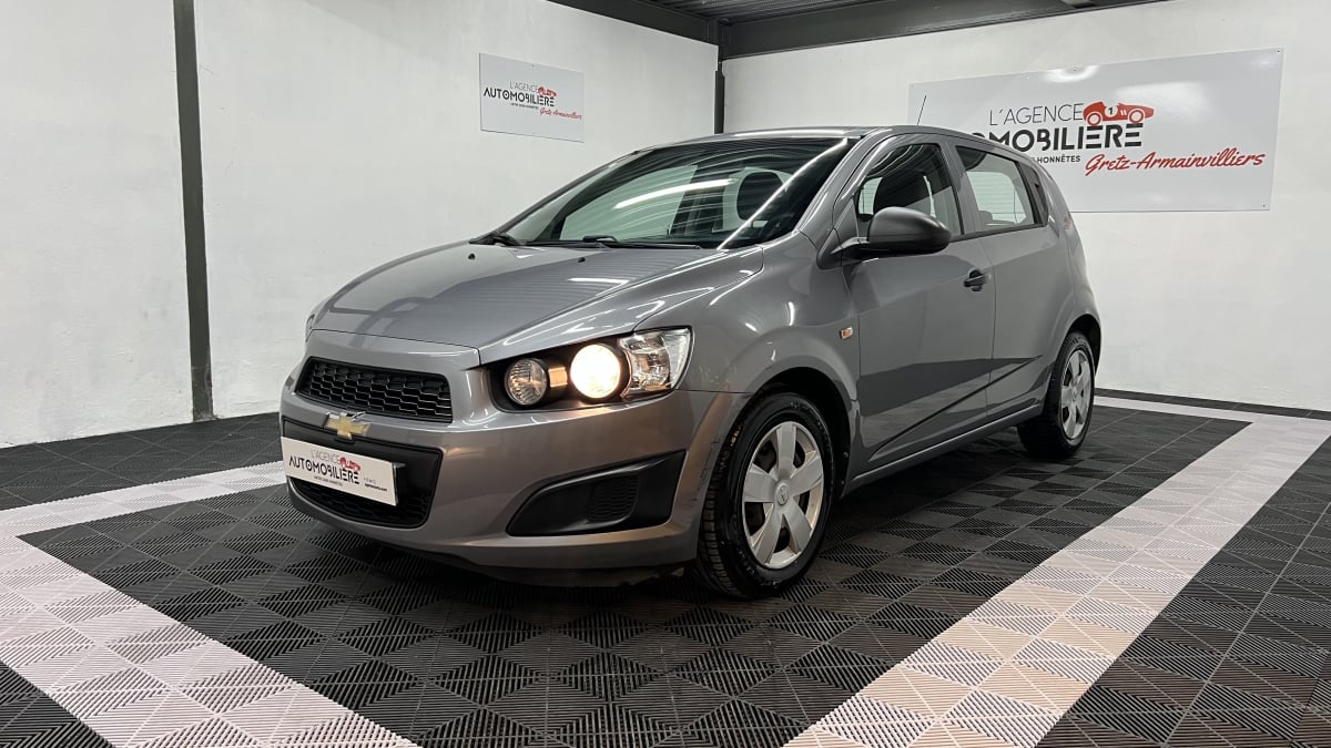 Chevrolet Aveo II 1.2 70 LS+ 5P — 1
