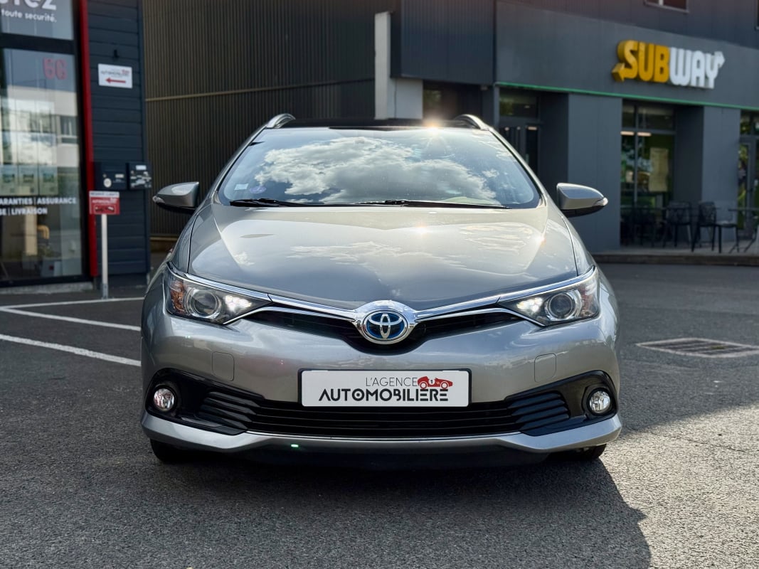 Toyota Auris Touring Sport 1.8 HSD 136H 100 FULL-HYBRID DYNAMIC BVA (Toit pano) — 2