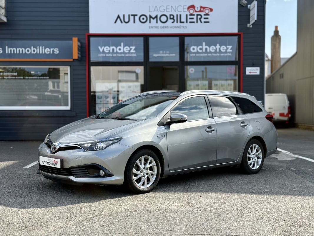 Toyota Auris Touring Sport 1.8 HSD 136H 100 FULL-HYBRID DYNAMIC BVA (Toit pano) — 1