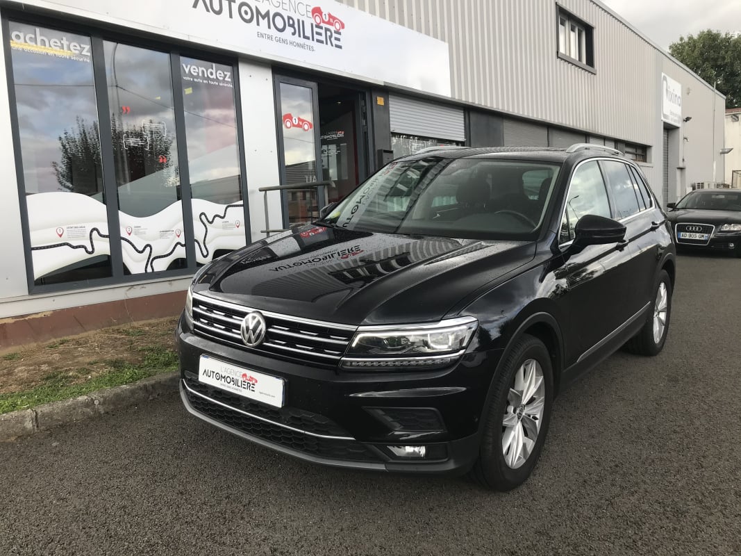 Volkswagen Tiguan 2.0 TDI 150 CH CARAT — 1