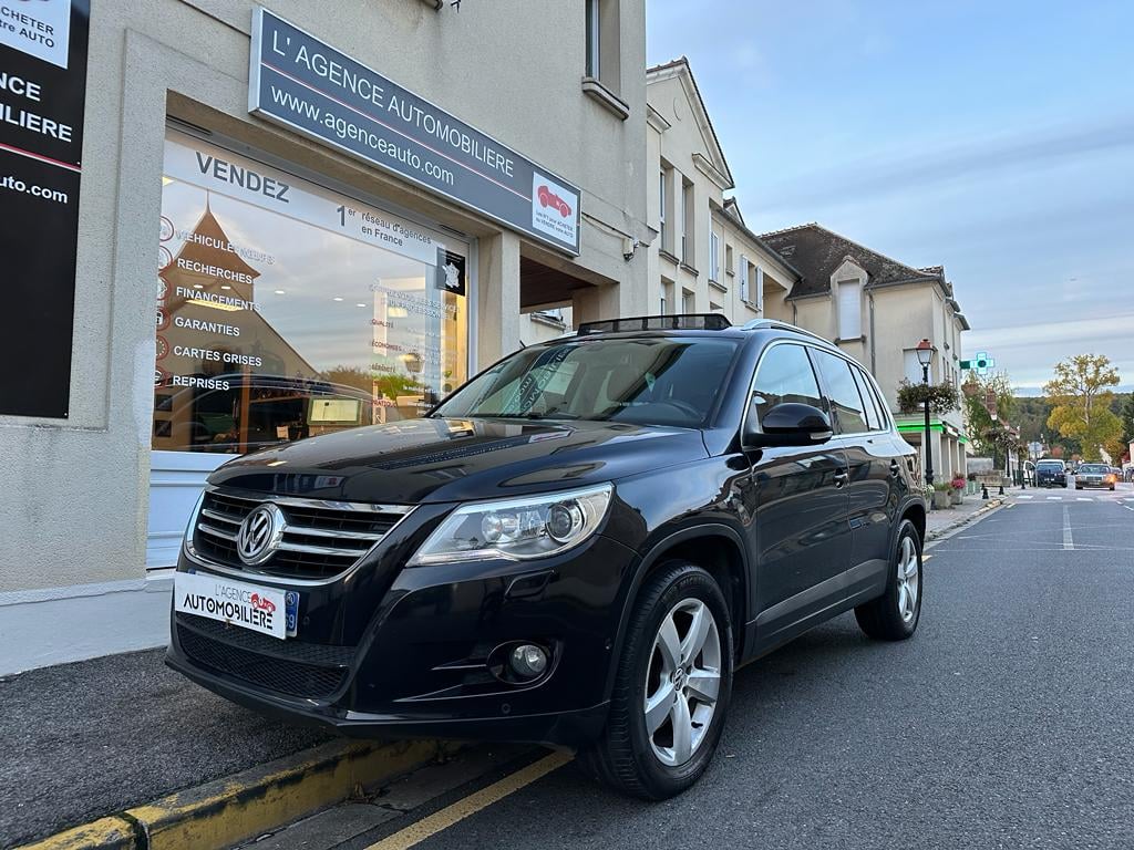 Volkswagen Tiguan TDI 140 4MOTION DSG CARAT SUIVI! — 1