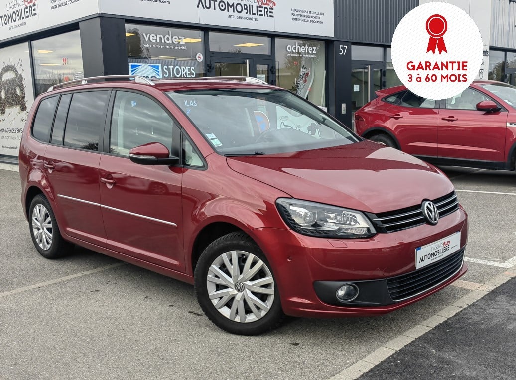 Volkswagen Touran 2.0 TDI 140 DSG CARAT — 1
